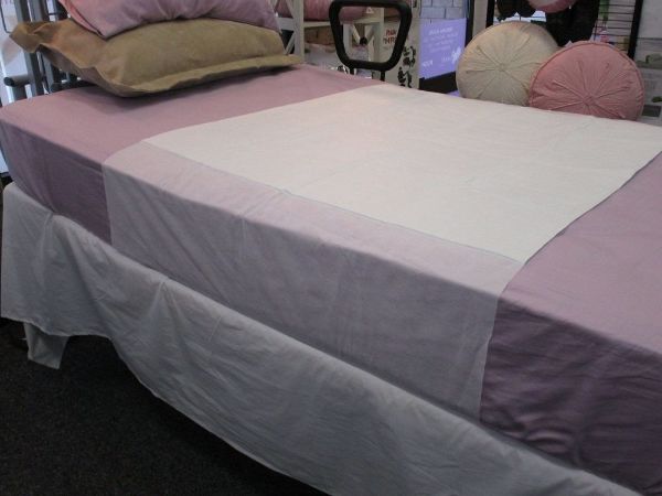 Picture of Economy Under Pad with Tuck-Ins - 15 Pack